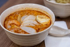 Laksa is a spicy noodle soup popular in Peranakan cuisine of Southeast Asia royalty free stock photography Laksa is a spicy noodle soup popular in Peranakan cuisine of Southeast Asia royalty free stock photography