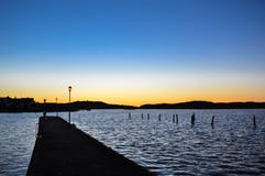 Lamppost and mountain silhouette at golden sunset royalty free stock photo Lamppost and mountain silhouette at golden sunset royalty free stock photo
