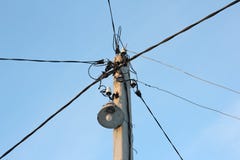 Lamppost With A Lot Of Wires In Different Directions Stock Image