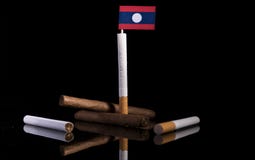 Laos flag with cigarettes and cigars. Royalty Free Stock Images Laos flag with cigarettes and cigars. Royalty Free Stock Images