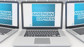 Lap-top με το λογότυπο της American Express στην οθόνη Εννοιολογική εκδοτική τρισδιάστατη απόδοση τεχνολογίας υπολογιστών απεικόνιση αποθεμάτων Lap-top με το λογότυπο της American Express στην οθόνη Εννοιολογική εκδοτική τρισδιάστατη απόδοση τεχνολογίας υπολογιστών απεικόνιση αποθεμάτων