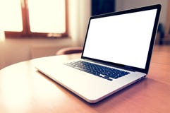 Laptop with blank screen on desk. stock photography Laptop with blank screen on desk. stock photography