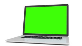 Laptop with green screen.