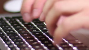 Laptop Keyboard. Man typing on keyboard MacBook Pro laptop. Sending a message via email. Good for a corporate technology edition Laptop Keyboard. Man typing on keyboard MacBook Pro laptop. Sending a message via email. Good for a corporate technology edition