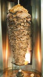 Large beef kebab on a spit roast stock photo Large beef kebab on a spit roast stock photo