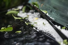 Large hail ice balls on car hood royalty free stock photos Large hail ice balls on car hood royalty free stock photos