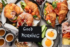 Large selection of breakfast food on a table