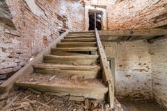 Large spacious forsaken empty basement room of ancient building or palace with cracked plastered brick walls, dirty floor and stock images Large spacious forsaken empty basement room of ancient building or palace with cracked plastered brick walls, dirty floor and stock images