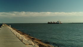 Large Transport Ship moving out to sea Royalty Free Stock Images Large Transport Ship moving out to sea Royalty Free Stock Images