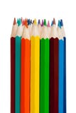 Las herramientas del arte - coloree los lápices en el fondo blanco Imagenes de archivo