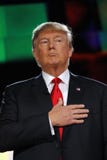 LAS VEGAS, NV - DECEMBER 15: Republican presidential frontrunner Donald J. Trump holds hand over heart at CNN republican president