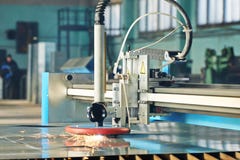 Laser or plasma cutting of metal sheet with sparks stock photo Laser or plasma cutting of metal sheet with sparks stock photo