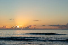 Last rays of the day shining from the clouds stock photo Last rays of the day shining from the clouds stock photo