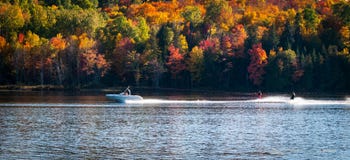 Late Summer On A Northern Ontario Lake - Getting In The Last Session Of Water Skiing. Stock Photo Late Summer On A Northern Ontario Lake - Getting In The Last Session Of Water Skiing. Stock Photo