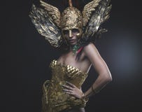 Latin woman with green hair and gold costume with handmade flour royalty free stock photo Latin woman with green hair and gold costume with handmade flour royalty free stock photo