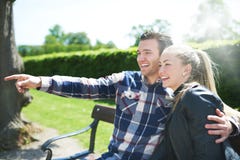 Laughing affectionate couple in the park stock images Laughing affectionate couple in the park stock images