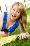 Laughing Girl With A Cellphone Stock Photos