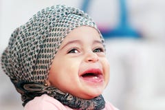 Laughing arab muslim baby girl