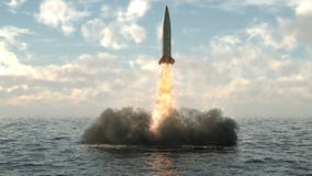 Launching a missile from under water from a submarine. Detailed realistic animation with dynamic fire exhaust, smoke and