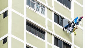 Laundry clothes hanging drying on window building Stock Photos Laundry clothes hanging drying on window building Stock Photos
