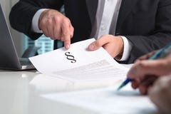 Lawyer giving legal advice to a client in office. stock image Lawyer giving legal advice to a client in office. stock image