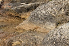 Layered mountain natural texture of ochre color stock images Layered mountain natural texture of ochre color stock images