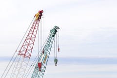 Le bras de la grue de construction photo stock Le bras de la grue de construction photo stock