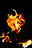 Le feu brûlant sur un fond noir Texture du feu, flamme sur un fond foncé Flamme chaude de couleur rouge-jaune Photographie stock Le feu brûlant sur un fond noir Texture du feu, flamme sur un fond foncé Flamme chaude de couleur rouge-jaune Photographie stock