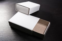Le match de papier enferme dans une boîte le calibre vide blanc Contraast de carton de cartons image stock Le match de papier enferme dans une boîte le calibre vide blanc Contraast de carton de cartons image stock