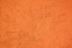 Le mur de ciment de fond a peint orange avec la texture photo stock Le mur de ciment de fond a peint orange avec la texture photo stock