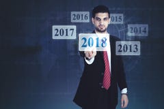 Le pressing Arabe d'homme d'affaires numéro 2018 photos libres de droits Le pressing Arabe d'homme d'affaires numéro 2018 photos libres de droits