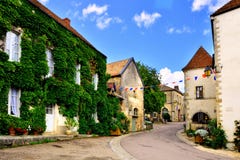 Leafy lane of a medieval village, Burgundy, France Royalty Free Stock Photo Leafy lane of a medieval village, Burgundy, France Royalty Free Stock Photo