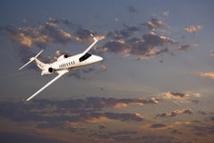 Learjet 45 with Sunset Clouds