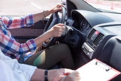 Learner driver student driving car with instructor Stock Image Learner driver student driving car with instructor Stock Image