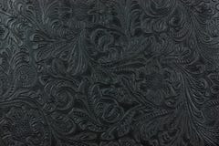 Leather. Detail of fancy tooled leather Leather. Detail of fancy tooled leather