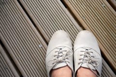 Leather shoes on wooden planks stock images Leather shoes on wooden planks stock images