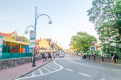 Street with tourists in Leba. Leba is resort on Baltic sea. Stock Photography Street with tourists in Leba. Leba is resort on Baltic sea. Stock Photography