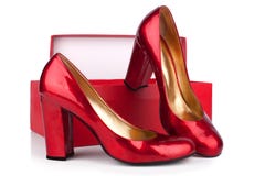 Leer van het de schoenenoctrooi van rode vrouwen high-heeled en rood vakje op witte dichte omhooggaand als achtergrond royalty-vrije stock afbeeldingen Leer van het de schoenenoctrooi van rode vrouwen high-heeled en rood vakje op witte dichte omhooggaand als achtergrond royalty-vrije stock afbeeldingen