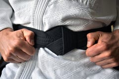 Legatura della cintura nera immagine stock Legatura della cintura nera immagine stock