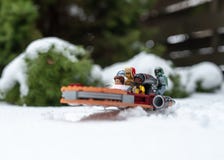 Lego star wars minifigures on the speeder during winter