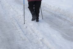 Legs of an elderly woman engaged in Scandinavian walking stock photography Legs of an elderly woman engaged in Scandinavian walking stock photography