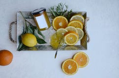 Lemons oranges and orange jam on a plate stock photo Lemons oranges and orange jam on a plate stock photo