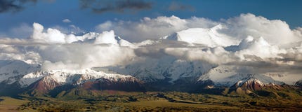 Lenin Peak from Alay range - Kyrgyz Pamir Mountains stock photo Lenin Peak from Alay range - Kyrgyz Pamir Mountains stock photo