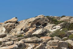 Les formations de roche dans les kolymbithres échouent, île de Paros, Grèce Photographie stock libre de droits Les formations de roche dans les kolymbithres échouent, île de Paros, Grèce Photographie stock libre de droits