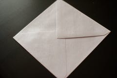 Letter envelope on black background. mock-up for your design stock photos Letter envelope on black background. mock-up for your design stock photos