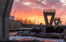 Lever de soleil au-dessus de chantier de construction image stock Lever de soleil au-dessus de chantier de construction image stock