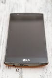 LG Smartphone on Wooden White Background royalty free stock images LG Smartphone on Wooden White Background royalty free stock images