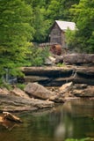 Lichtungs-Nebenfluss-Mahlgut-Mühle lizenzfreies stockfoto Lichtungs-Nebenfluss-Mahlgut-Mühle lizenzfreies stockfoto