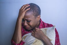 Lifestyle Indoors Portrait Of Young Sad And Depressed Black Afro American Woman Sitting At Home Floor Feeling Desperate And Worrie Royalty Free Stock Photography Lifestyle Indoors Portrait Of Young Sad And Depressed Black Afro American Woman Sitting At Home Floor Feeling Desperate And Worrie Royalty Free Stock Photography