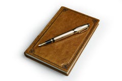 Light brown leather journal with the posted golden fountain pen over the book cover stock photography Light brown leather journal with the posted golden fountain pen over the book cover stock photography